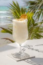 Cocktail in highball glass on tre beach Royalty Free Stock Photo