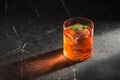 Cocktail with ice cubes and basil leaf Royalty Free Stock Photo