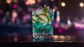 Cocktail with lime, mint and ice on bar counter in nightclub