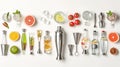 Cocktail making ingredients and tools neatly arranged on a white background