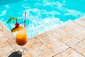 Cocktail near the swimming pool Royalty Free Stock Photo