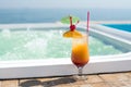 Cocktail near the swimming pool Royalty Free Stock Photo