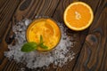 Orange juice with mint and ice rustic wooden table Royalty Free Stock Photo