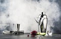 Cocktail preparation scene with bar tools and ingredients, gray bar counter background, copy space Royalty Free Stock Photo