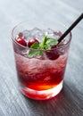 Cocktail red cherry in glass with tubule Royalty Free Stock Photo