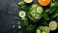 Cocktail of spinach and green vegetables and fruit, drink background, top view Royalty Free Stock Photo