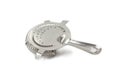 A cocktail strainer isolated on a crisp white background