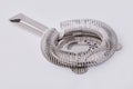 Cocktail strainer,  tool of the bartender on white background. Royalty Free Stock Photo