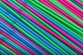 Cocktail straws abstract background of different colors