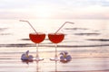 Cocktails on the beach at sunset, two glasses Royalty Free Stock Photo