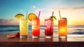 Cocktails with fruit wedges stacked on a beach, refreshing drinks Royalty Free Stock Photo