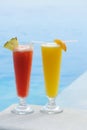 Cocktails near swimming pool Royalty Free Stock Photo