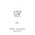Cocktails party. New year evening. Happy new year greeting card. Wine glass with colorful light bulb