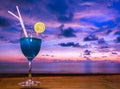 Cocktails at sunset with colourful sky background Royalty Free Stock Photo