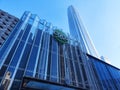 COCO Park Mall B entrance with the Ping An Finance Centre in the background at Futian Central Business District in Shenzhen. Royalty Free Stock Photo