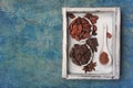 Cocoa beans and chocolate chunks with powder for confectionery in white wooden box Royalty Free Stock Photo