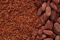 Cocoa beans and grated chocolate background Royalty Free Stock Photo