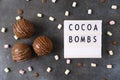 Cocoa bombs with marshmallows, chocolate that melts when hot milk is added for creating a trendy tasty drink. Food