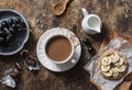 Cocoa, cracker with peanut butter, banana, flax and chia seed, grapes - snack, breakfast table. Cosy atmosphere breakfast on wood Royalty Free Stock Photo