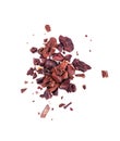 Cocoa crumb. Peeled cacao beans, isolated on white background. Roasted and aromatic cocoa beans, natural chocolate.