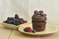 Cocoa muffins with fresh berries