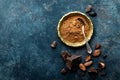 Cocoa powder, beans and dark chocolate pieces crushed, culinary background Royalty Free Stock Photo