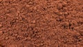 cocoa powder in a bowl shot on a macro lens, powder for making chocolate. Royalty Free Stock Photo