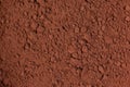 cocoa powder in a bowl shot on a macro lens, powder for making chocolate. Royalty Free Stock Photo