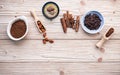 Cocoa powder and cacao beans on wooden background Royalty Free Stock Photo