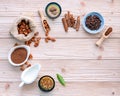 Cocoa powder and cacao beans on wooden background Royalty Free Stock Photo