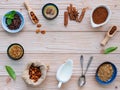 Cocoa powder and cacao beans on wooden background Royalty Free Stock Photo