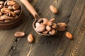 Cocoa powder and cacao beans on wooden background. Dark chocolate pieces crushed and aromatic herbs . Royalty Free Stock Photo