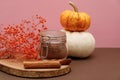 Cocoa Powder, cinnamon sticks, Ripe pumpkins