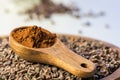 Cocoa powder - coleup in wooden spoon Royalty Free Stock Photo