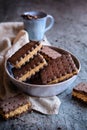 Cocoa sandwich biscuits stuffed with walnut and coffee filling