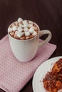 Cocoa in a white mug with marshmallow