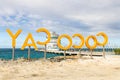 CocoCay sign in front of a Royal Caribbean cruise ship.