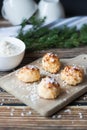 Coconut baking, sweet dessert. On a wooden background