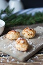 Coconut baking, sweet dessert. On a wooden background