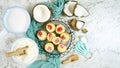 Coconut baking theme flat lay creative layout overhead with baked macaroons.