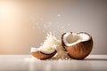 Coconut broken into pieces with flying pieces of coconut on a white background Royalty Free Stock Photo