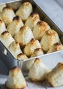 Coconut candy tucked inside an elegant metal box, studio photography