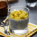 Coconut Chia seed pudding with pineapple, dark background copy space. Healthy food breakfast. Square image Royalty Free Stock Photo