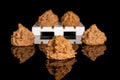 Coconut chocolate biscuit isolated on black glass