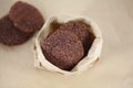 Coconut chocolate cookies in brown paper bag Royalty Free Stock Photo