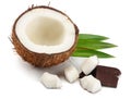 Coconut with chocolate and green leaves isolated on white background Royalty Free Stock Photo