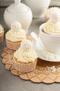 Coconut cupcakes with white frosting Royalty Free Stock Photo