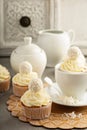 Coconut cupcakes with white frosting Royalty Free Stock Photo