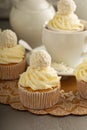 Coconut cupcakes with white frosting