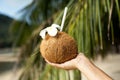 Coconut drink in hand Royalty Free Stock Photo